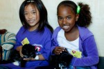 Kids at SPCA with kitten